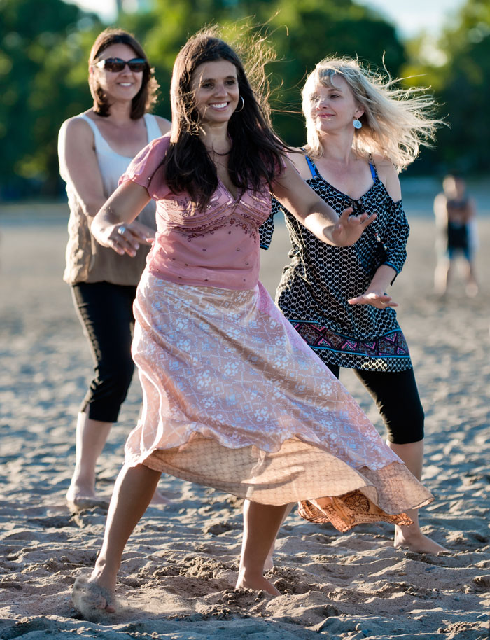 Dancing on the beach with Jill Hewlett (centre) 